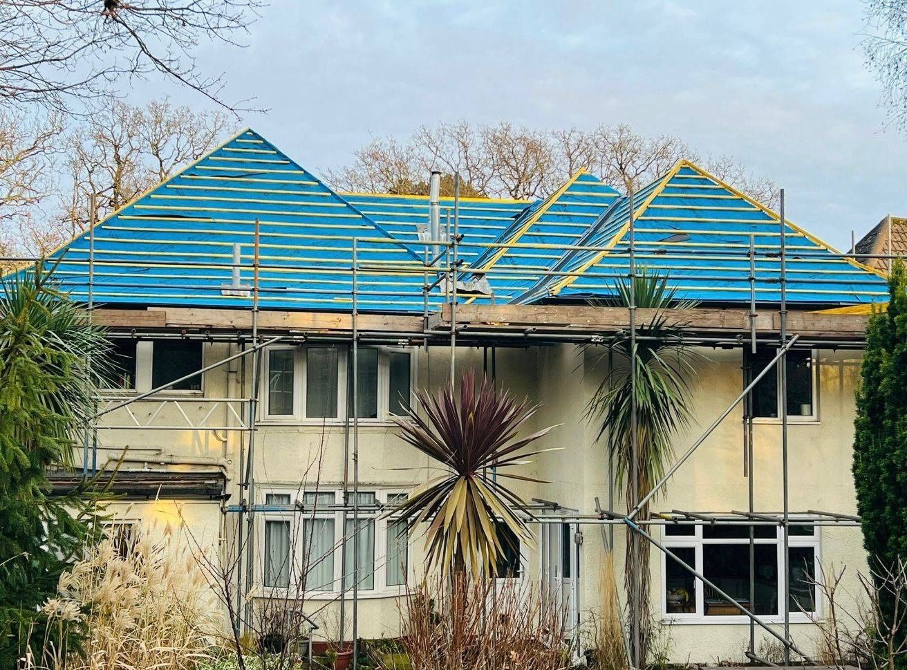 Canterbury hipped roof stripped to the rafters with breathable membrane laid, full scaffold in place