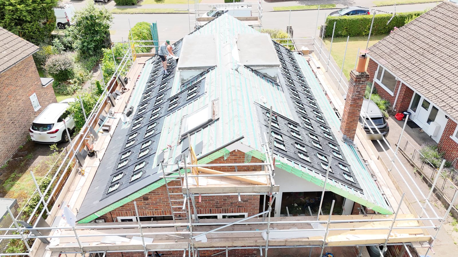 In-roof solar mounting trays fixed into both slopes of a Canterbury bungalow roof